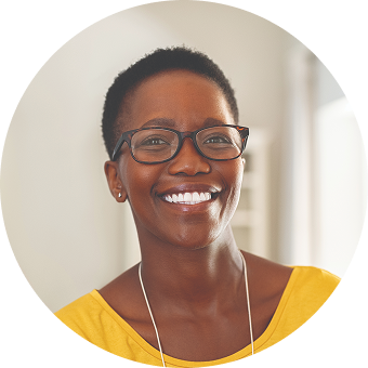 Woman smiling in yellow shirt