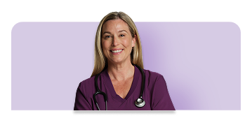 Nurse smiling in burgundy scrub shirt with purple background