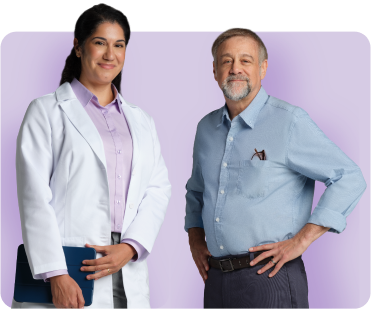 Female doctor with male patient smiling with purple background