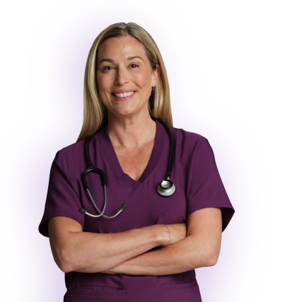 Nurse smiling in burgundy scrub shirt